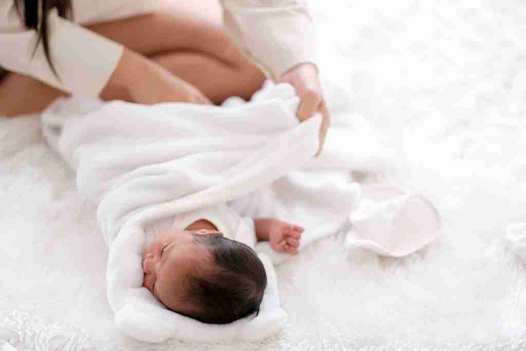 Newborn baby nappy change