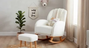 Luxury nursery with upholstered velvet cot bed and warm natural light